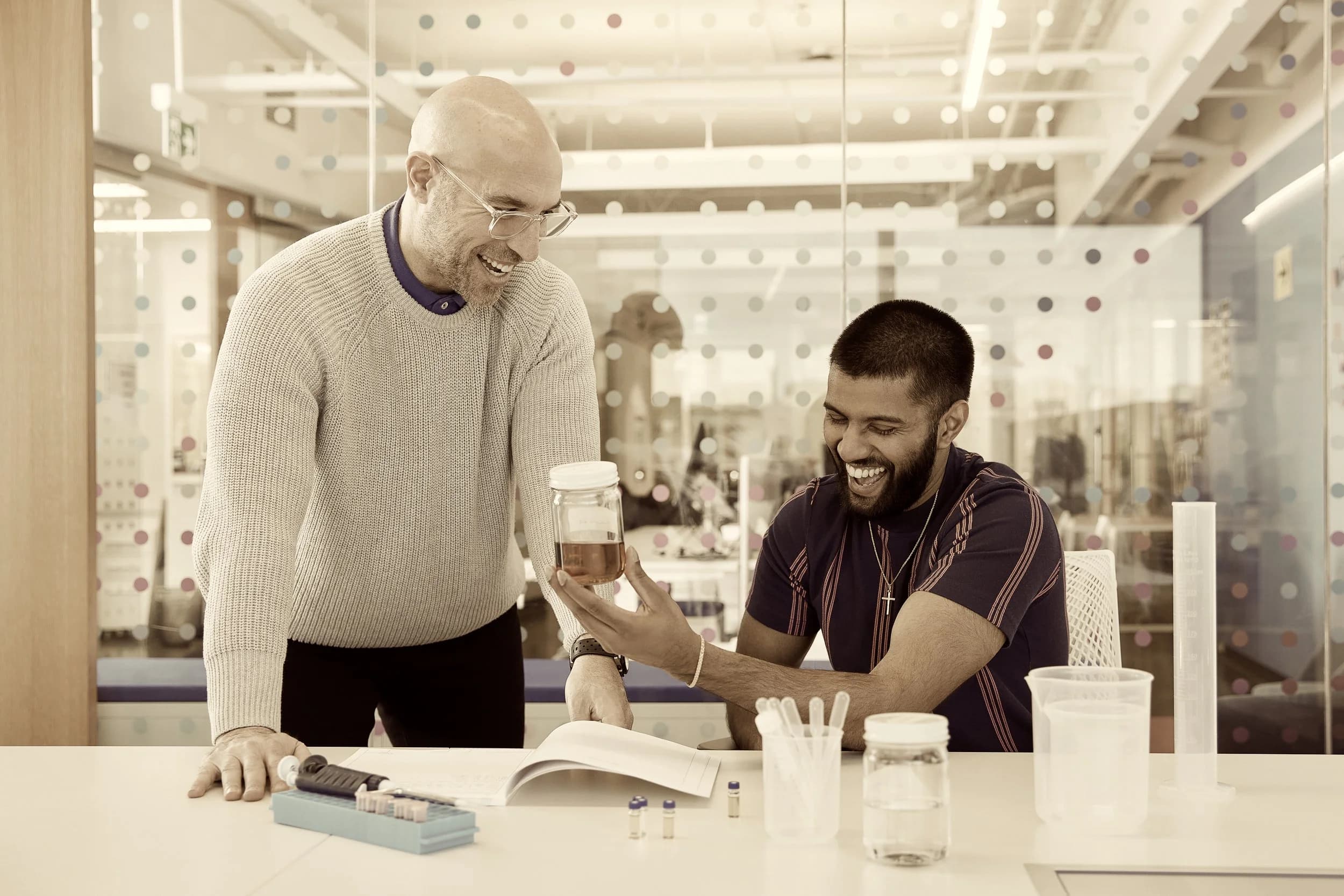 Marc Adler and David Raveenthrarajan working together in the lab